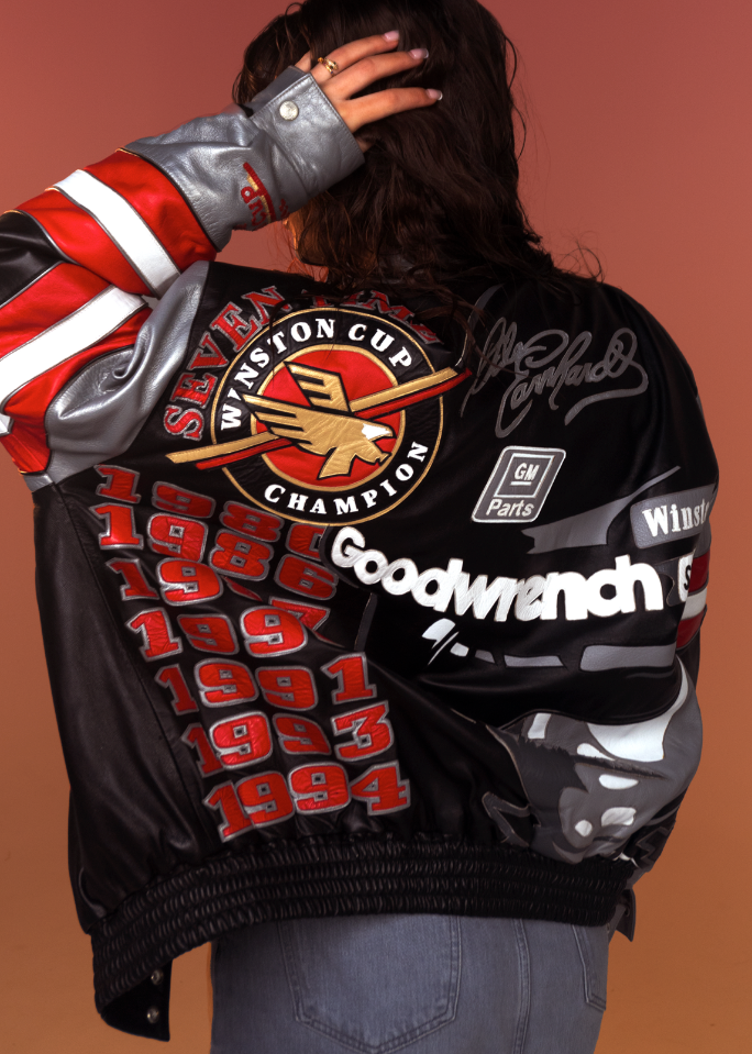 Dale Earnhardt shops 7 time championship leather jacket.